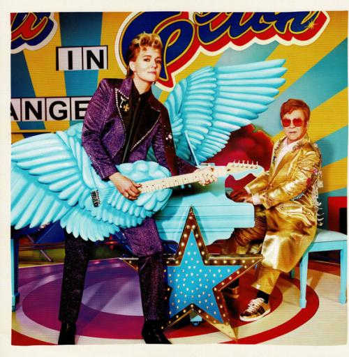 Виниловая пластинка Elton John; Carlile, Brandi - Who Believes in Angels? (Neon Pink Transparent & Yellow Spiral Effect Vinyl LP, 16pp Booklet)